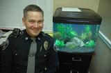 Police Officer Uses Fish To Calm Kids